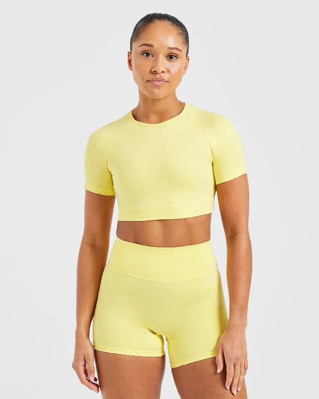 Staple Crop Top - Pastel Lemon Zippered Buttoned Snapped